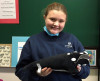 student-holding-whale-plushie